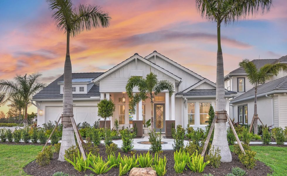 Front exterior of a new home in Wellen Park, Venice, FL, highlighting curb appeal (Image 1). Front exterior of a new home in Wellen Park, Venice, FL, highlighting curb appeal (Image 1).