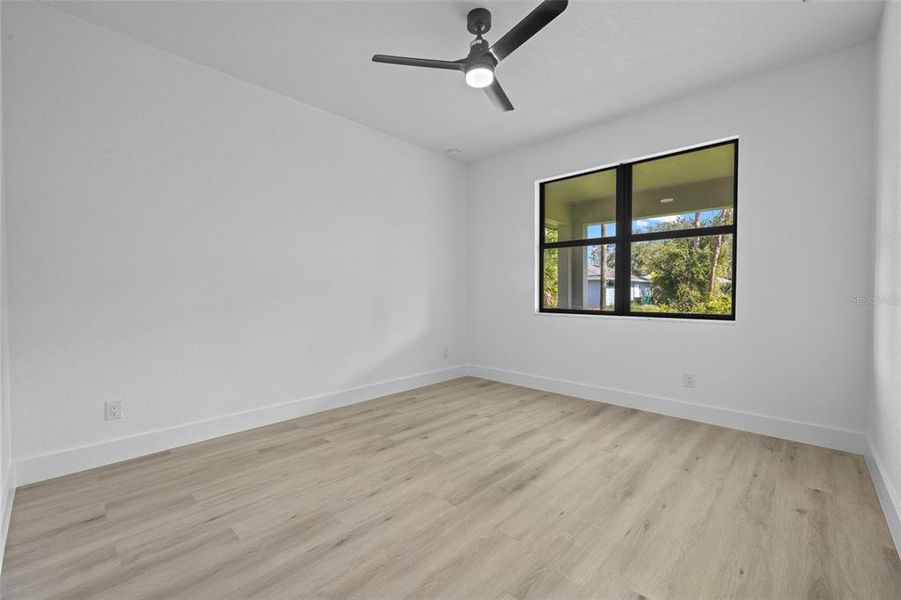 Spacious, unfurnished interior of a new home in , Port Charlotte (Image 22).