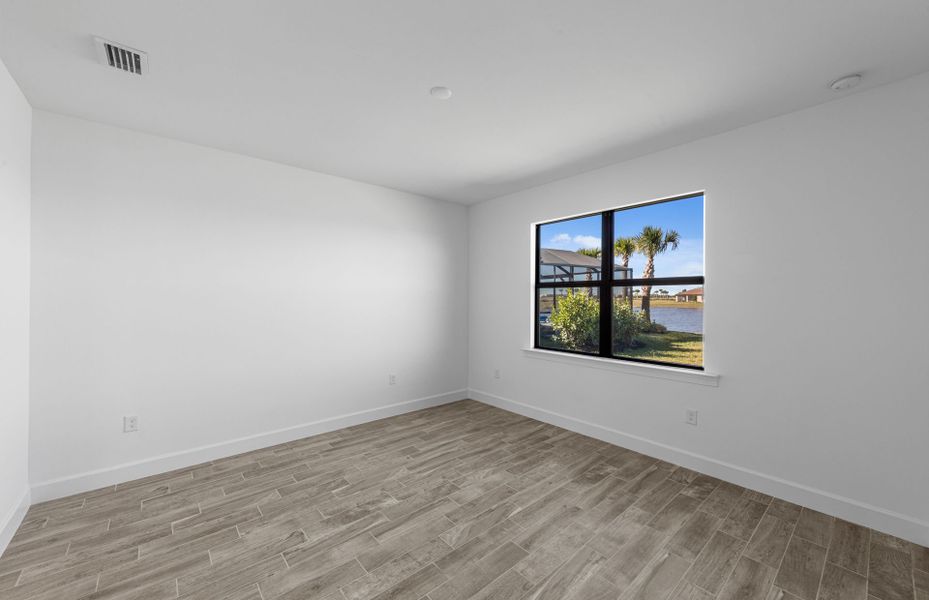 Spacious, unfurnished interior of a new home in Del Webb Naples, Ave Maria (Image 13).