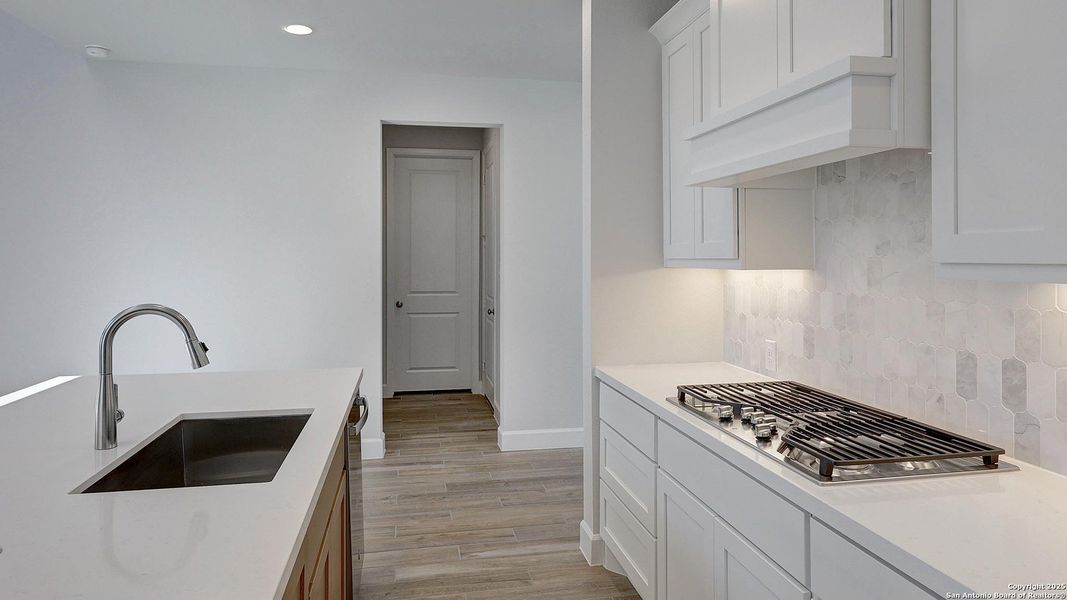 Furnished interior view inside a new home in Ladera 50', San Antonio (Image 7).