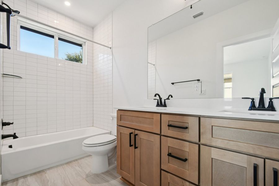 Furnished interior view inside a new home in Koenig Townhomes, Austin (Image 15).