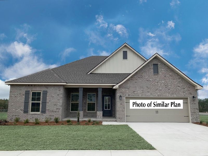 Front exterior of a new home in Sentinel Ridge, Pace, FL, highlighting curb appeal (Image 2).