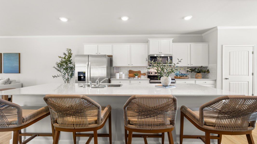 Representative furnished interior of a home built from the ADDINGTON by D.R. Horton in Waypoint, Flowery Branch (Image 5).