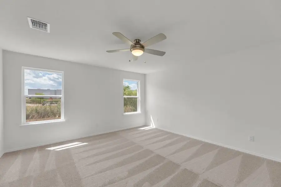 Spacious, unfurnished interior of a new home in Mustang Valley, Manor (Image 31).