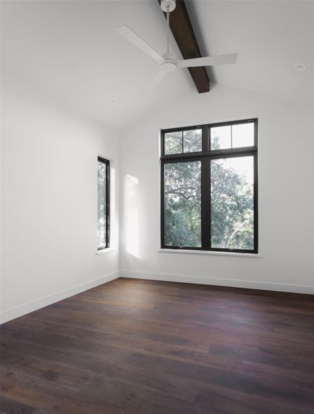 Multi-generational comfort. This secondary suite is tucked away on the first floor and features its own private living quarters, offering a level of independence and privacy rarely found in a standard floorplan. It’s the perfect setup for long-term guests.