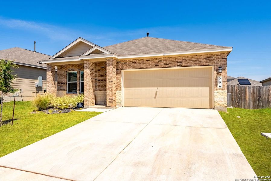 Front exterior of a new home in , Bulverde, TX, highlighting curb appeal (Image 28).