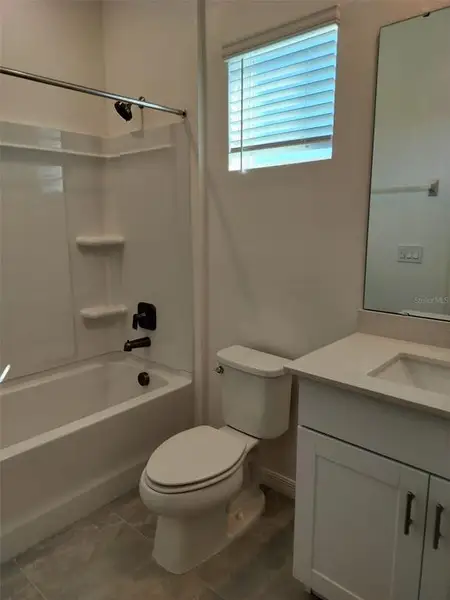 Furnished interior view inside a new home in Loch Leven Park, Mount Dora (Image 5).