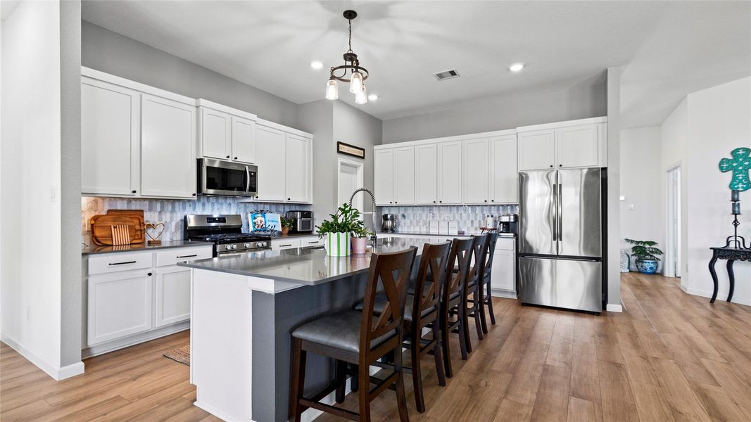 Discover a spacious kitchen perfect for honing your culinary skills, with abundant cabinets and a seamless layout for effortless cooking. Discover a spacious kitchen perfect for honing your culinary skills, with abundant cabinets and a seamless layout for effortless cooking.