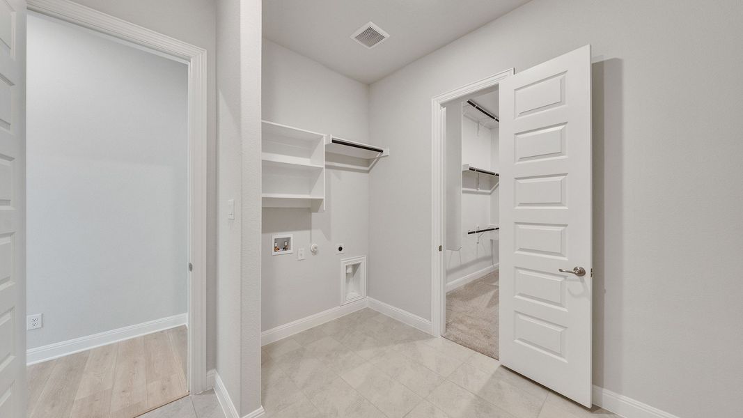 Furnished interior view inside a new home in Hawkes Landing, Leander (Image 9).