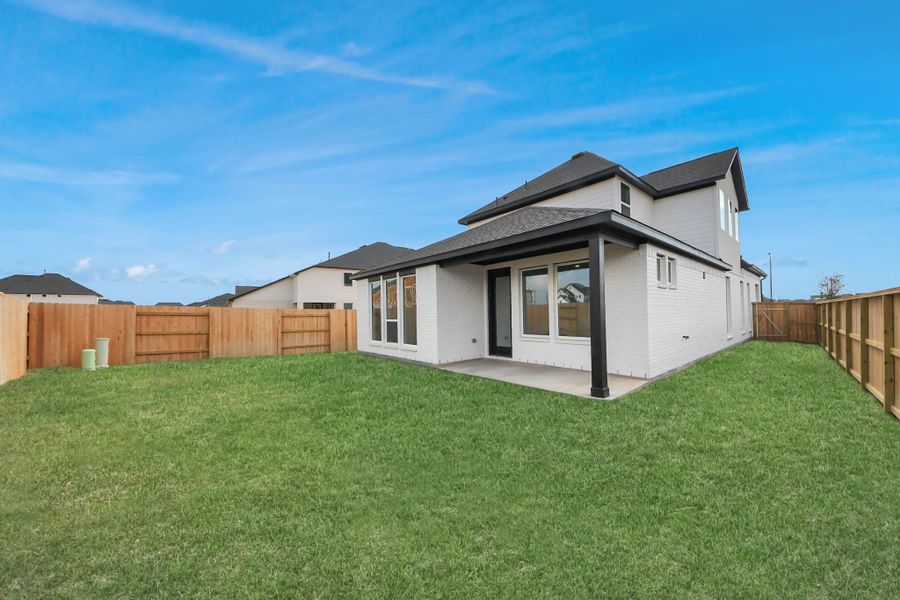 Exterior details and patio area of a home in Elyson, Katy (Image 24).