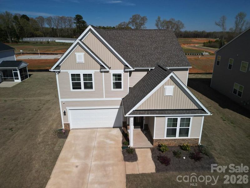 Front exterior of a new home in Clairmont, Charlotte, NC, highlighting curb appeal (Image 2). Front exterior of a new home in Clairmont, Charlotte, NC, highlighting curb appeal (Image 2).
