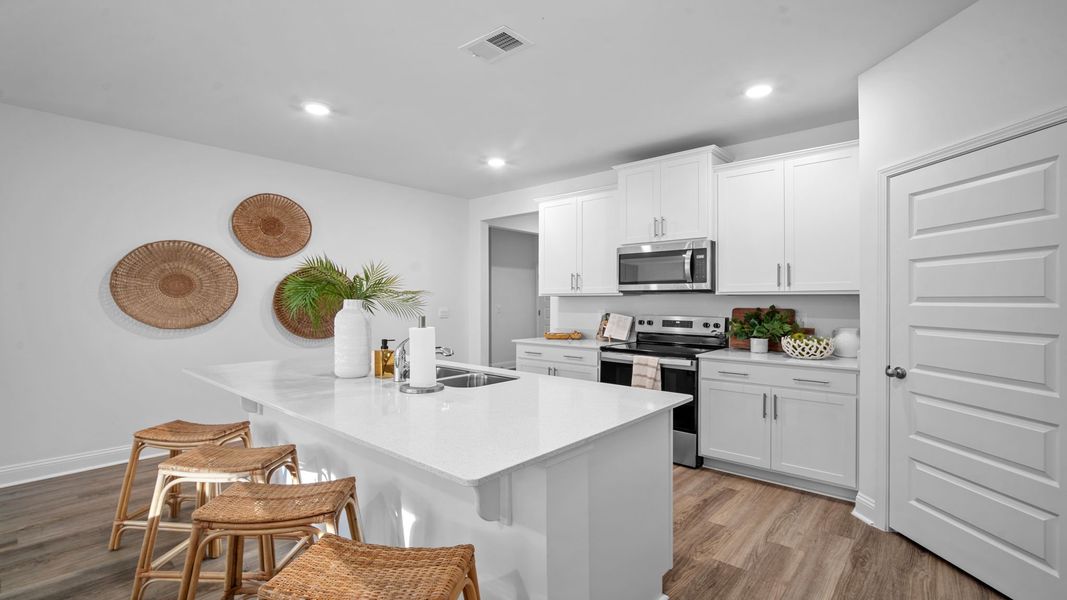 Furnished interior view inside a new home in The Lakes at North Glynn, Brunswick (Image 6).