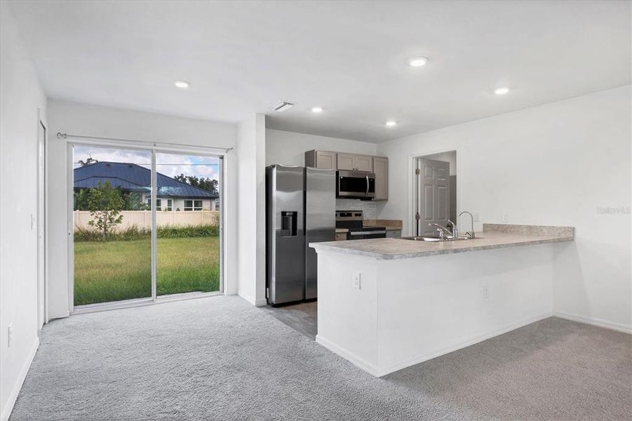 Furnished interior view inside a new home in , North Port (Image 9).