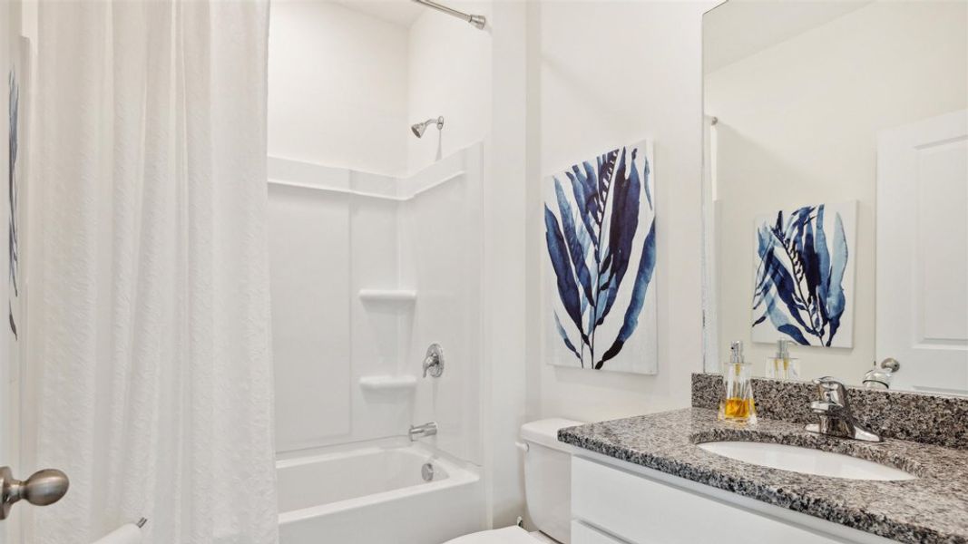 Furnished interior in a model home at Price's Point in Knoxville (Image 19).