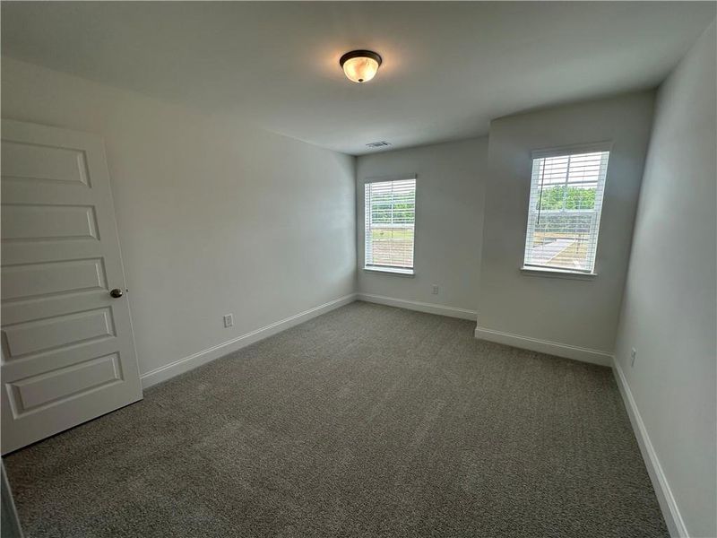 Spacious, unfurnished interior of a new home in Mulberry Summit, Flowery Branch (Image 19).