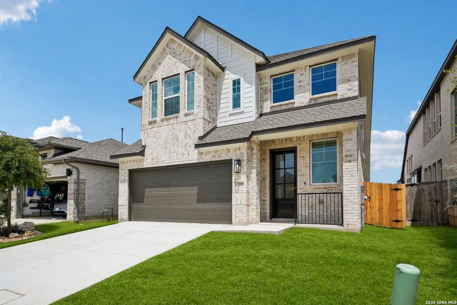 Front exterior of a new home in Legacy at Lake Dunlap, New Braunfels, TX, highlighting curb appeal (Image 1). Front exterior of a new home in Legacy at Lake Dunlap, New Braunfels, TX, highlighting curb appeal (Image 1).