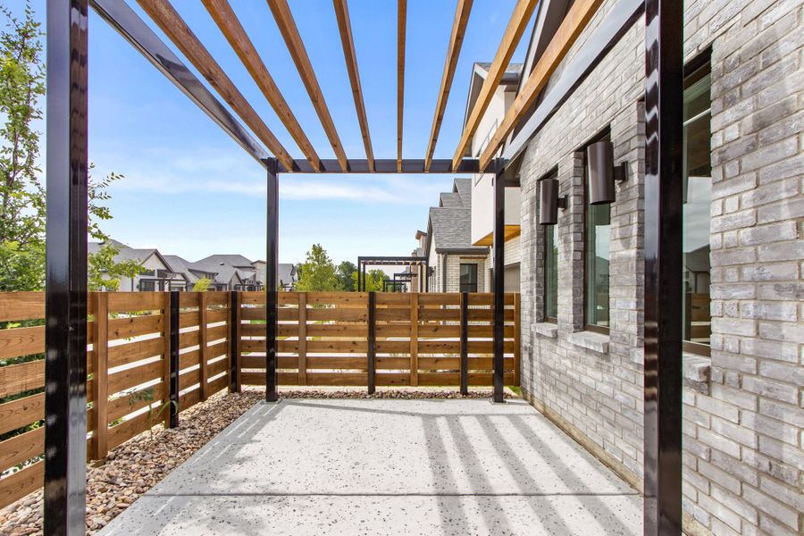 Exterior details and patio area of a home in Willow Grove Single-Family Homes, Melissa (Image 4). Exterior details and patio area of a home in Willow Grove Single-Family Homes, Melissa (Image 4).