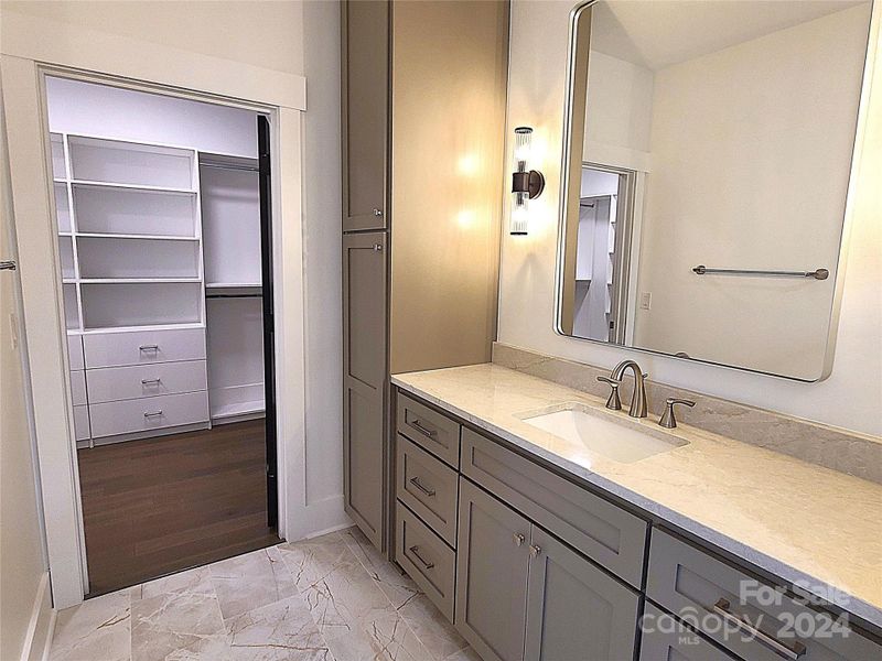 Primary bath entry to walk in closet