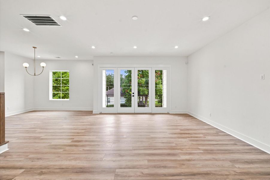 Covered balcony extends the living space, while the recessed dining area offers a dedicated space for meals and entertaining. Covered balcony extends the living space, while the recessed dining area offers a dedicated space for meals and entertaining.