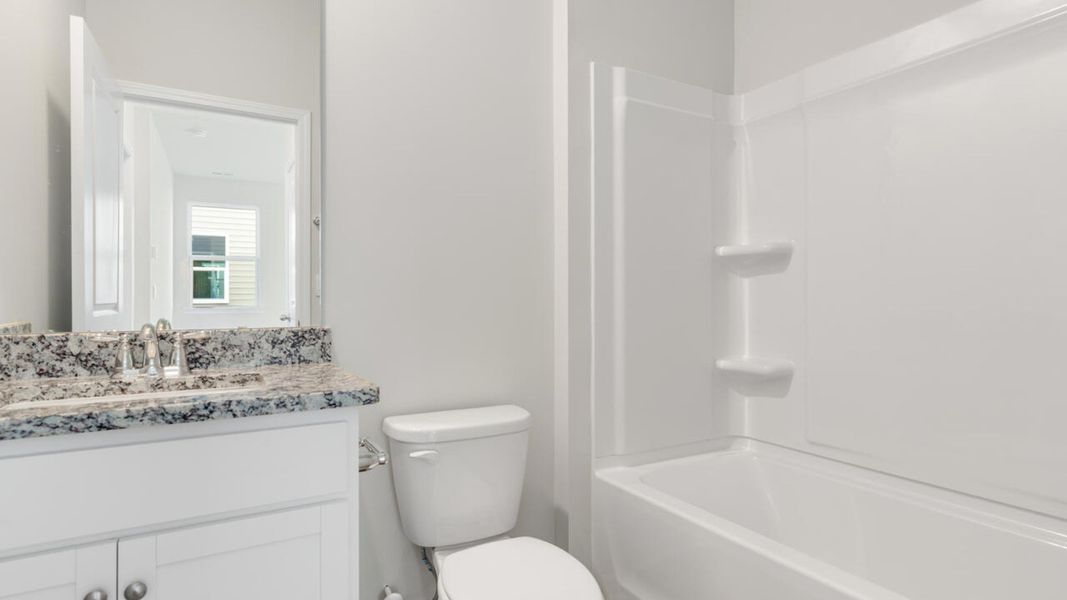 Representative furnished interior of a home built from the DELANEY by D.R. Horton in The Cottages at Blake Farm, Wilmington (Image 23). Representative furnished interior of a home built from the DELANEY by D.R. Horton in The Cottages at Blake Farm, Wilmington (Image 23).