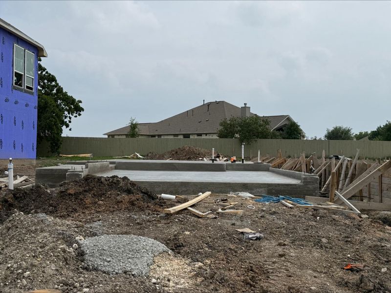 Concrete slab foundation with plumbing rough-ins