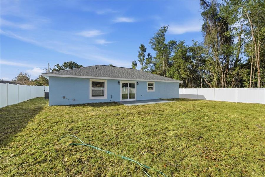 Exterior details and patio area of a home in , Summerfield (Image 23). Exterior details and patio area of a home in , Summerfield (Image 23).