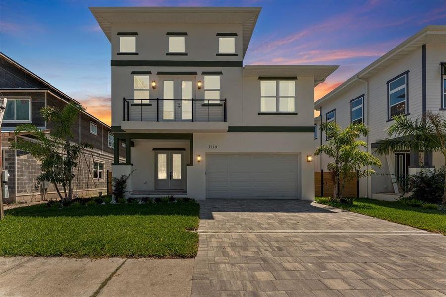 Front exterior of a new home in Wyoming Estates, Tampa, FL, highlighting curb appeal (Image 24). Front exterior of a new home in Wyoming Estates, Tampa, FL, highlighting curb appeal (Image 24).