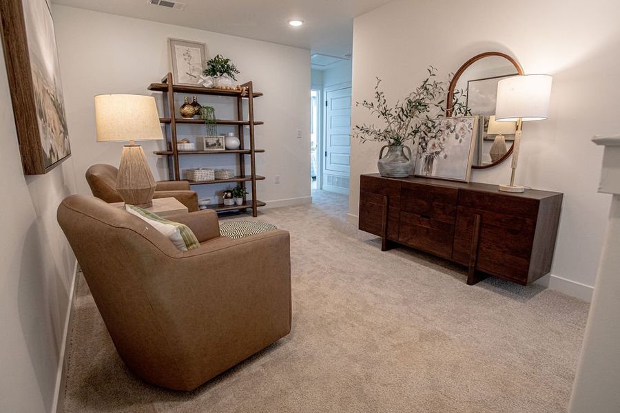 Representative furnished interior of a home built from the Provost by Grant & Co in The Townhomes at Union Depot, Bartlett (Image 25).