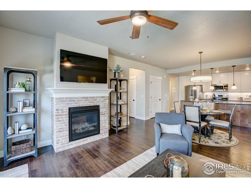 Gorgeous, bright open living space! Photos of a previously built model.