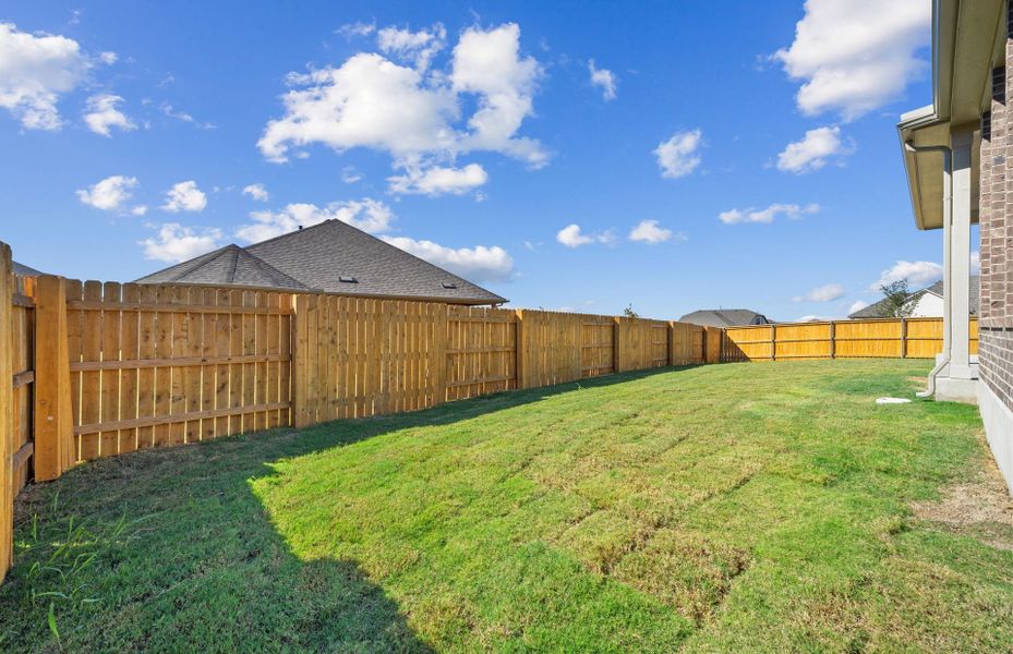 Exterior details and patio area of a home in 6 Creeks, Kyle (Image 3).