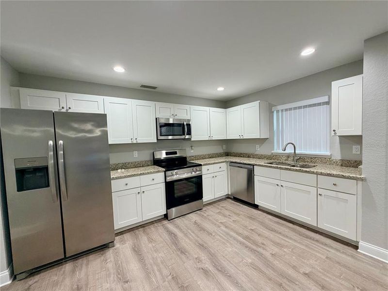 Furnished interior view inside a new home in , Babson Park (Image 12).