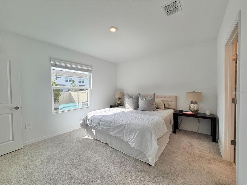 Furnished interior view inside a new home in Westview Community Group Page, Kissimmee (Image 30).