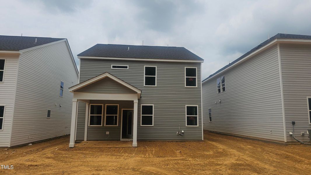 Front exterior of a new home in Gregory Village, Lillington, NC, highlighting curb appeal (Image 40).