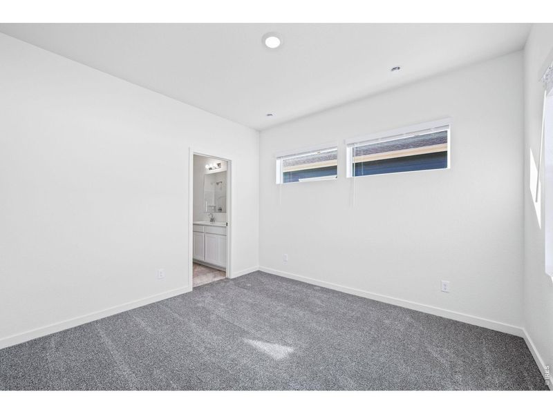 Spacious, unfurnished interior of a new home in Union Colony West, Greeley (Image 10).