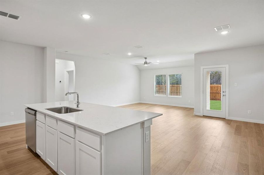 Open Floor Plan in the Heisman home plan by Trophy Signature Homes – REPRESENTATIVE PHOTO