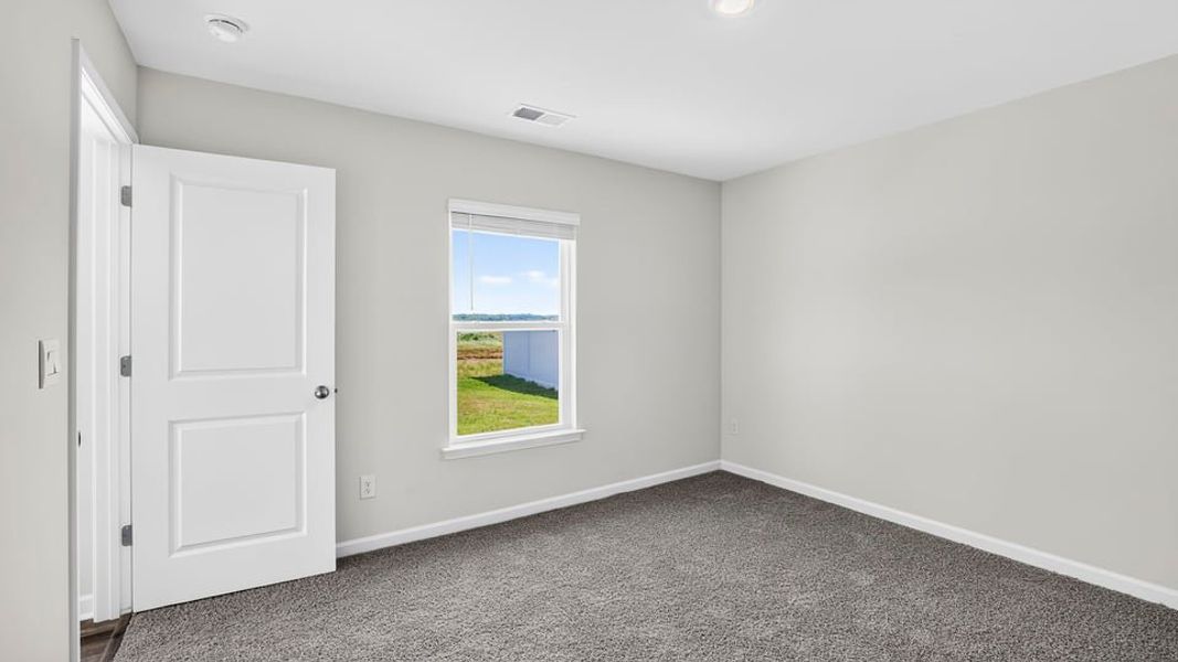 Spacious, unfurnished interior of a new home in Gibson Grove, Laurens (Image 30).