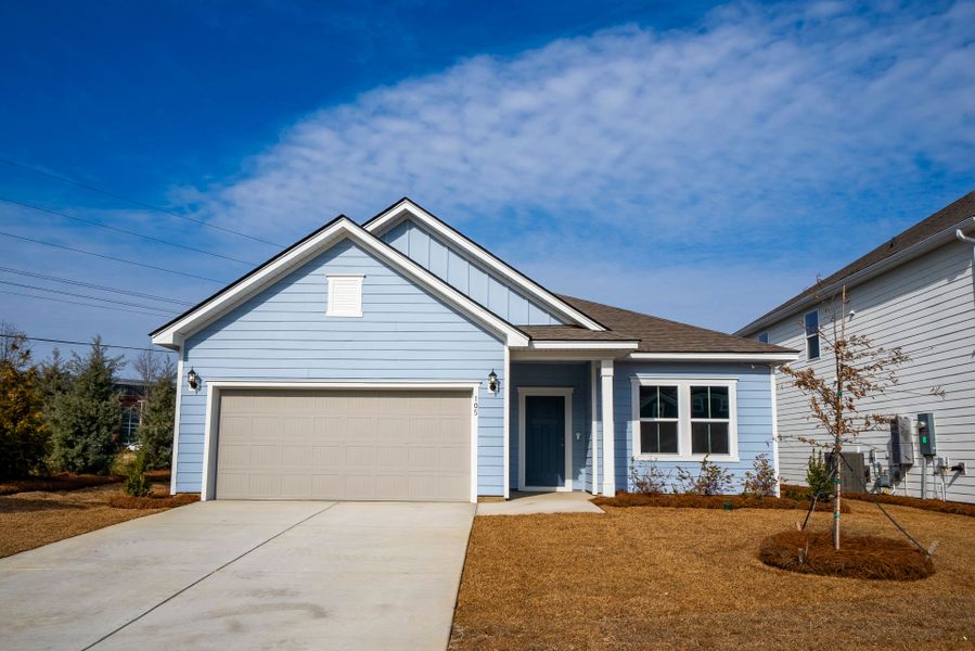 Front exterior of a new home in Monroe Preserve, Chapin, SC, highlighting curb appeal (Image 27).
