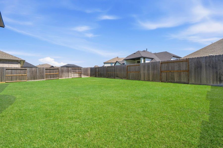 Exterior details and patio area of a home in The Highlands, Porter (Image 24).