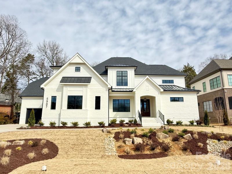 Front exterior of a new home in , Charlotte, NC, highlighting curb appeal (Image 10).
