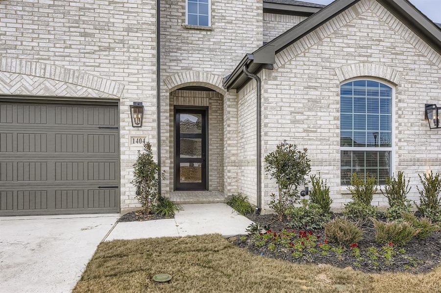 Exterior details and patio area of a home in Sweetgrass 50s, Haslet (Image 20).