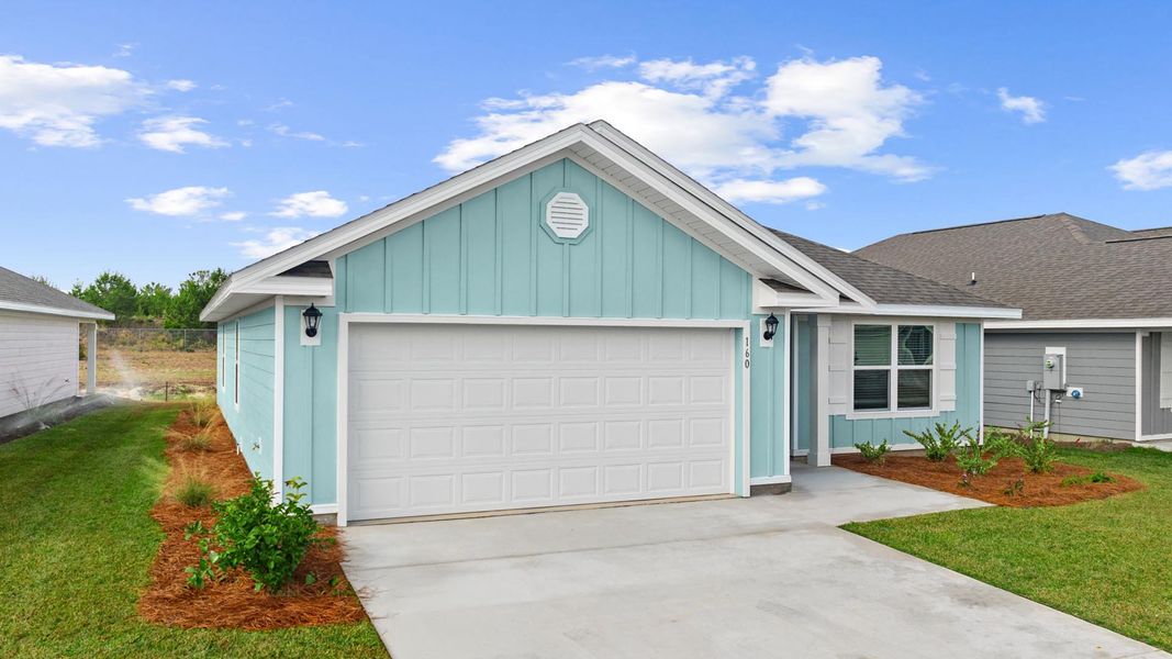 Front exterior of a new home in Owl's Head Farms, Freeport, FL, highlighting curb appeal (Image 20).