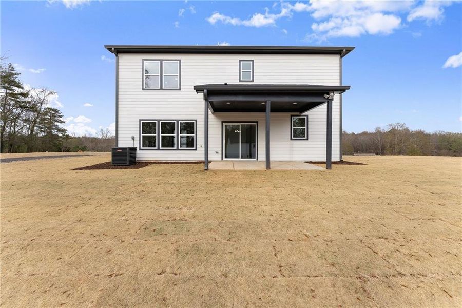 Front exterior of a new home in , Jefferson, GA, highlighting curb appeal (Image 19).