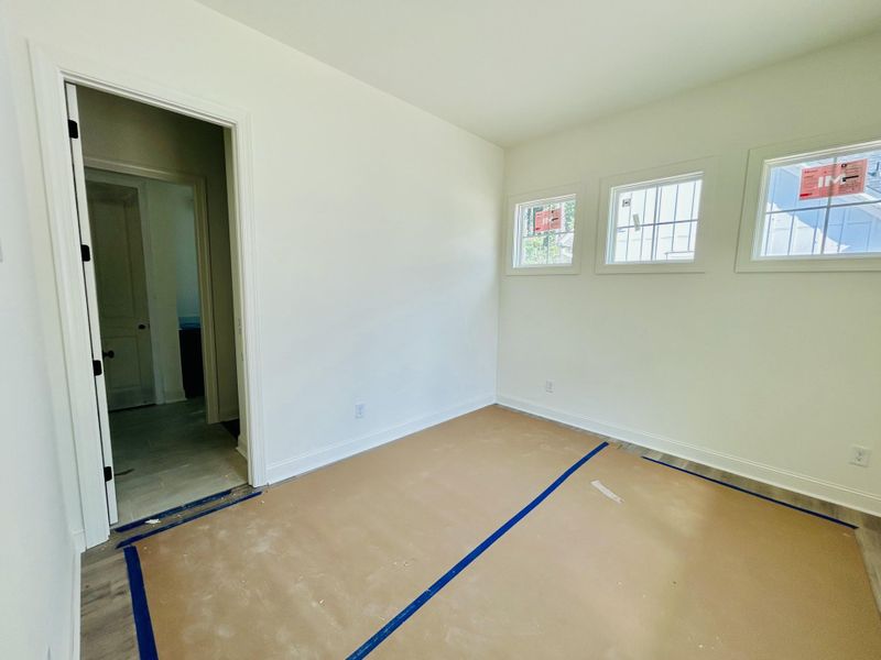 Spacious, unfurnished interior of a new home in The Domus Collection at Midtown Nexton, Summerville (Image 54).