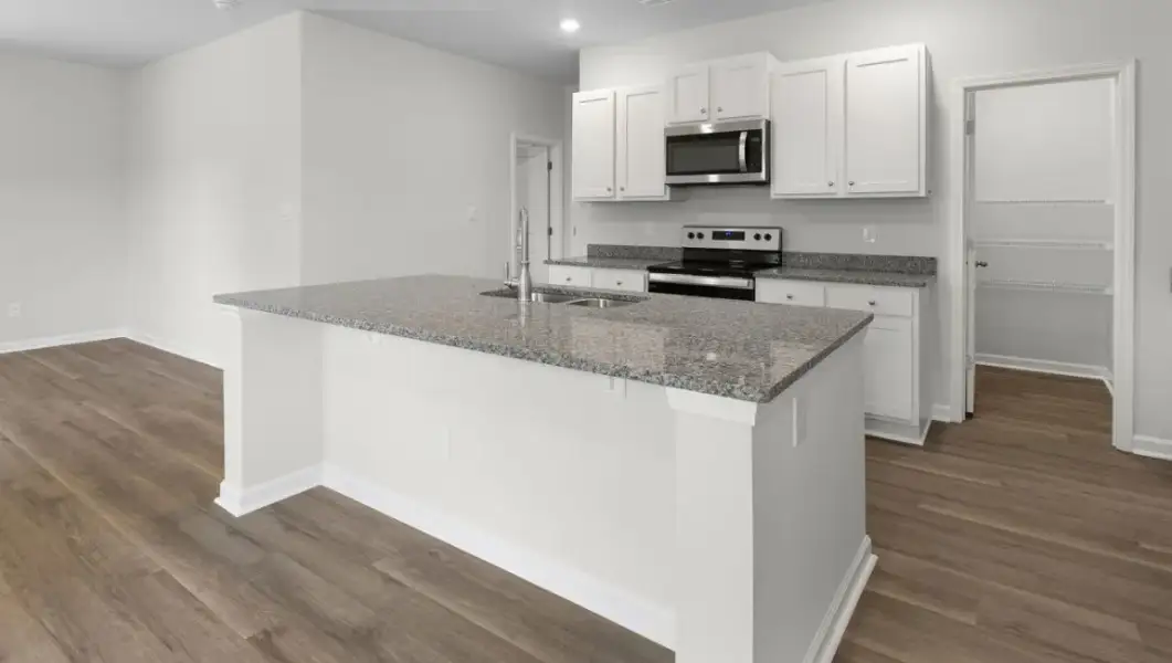 Furnished interior view inside a new home in The Highlands at Cedar Hill Landing, Navassa (Image 8).