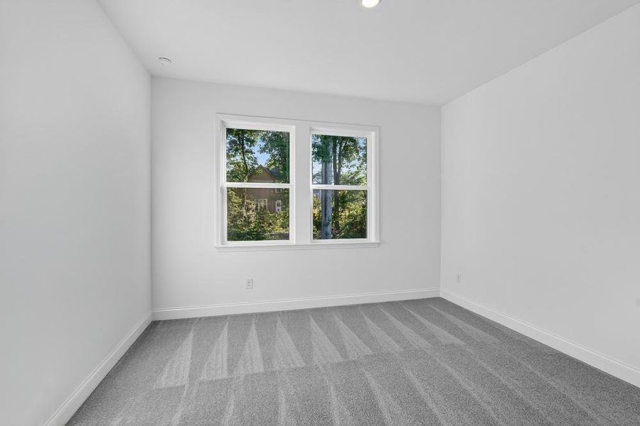 Spacious, unfurnished interior of a new home in Bailey Fence, Dacula (Image 40).