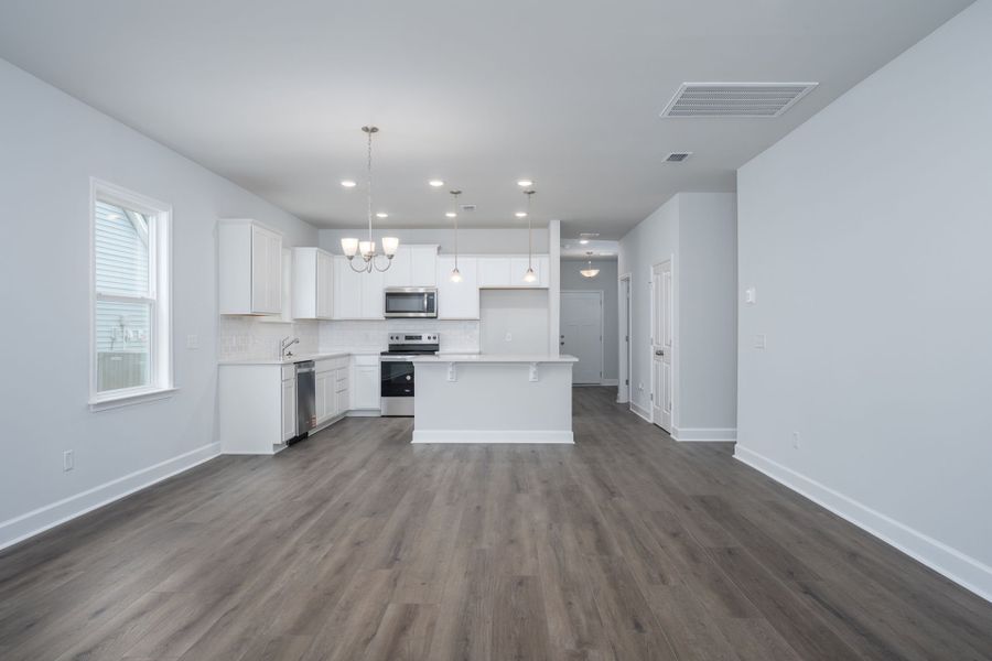 Café Area that opens to the Kitchen and gathering room. Café Area that opens to the Kitchen and gathering room.