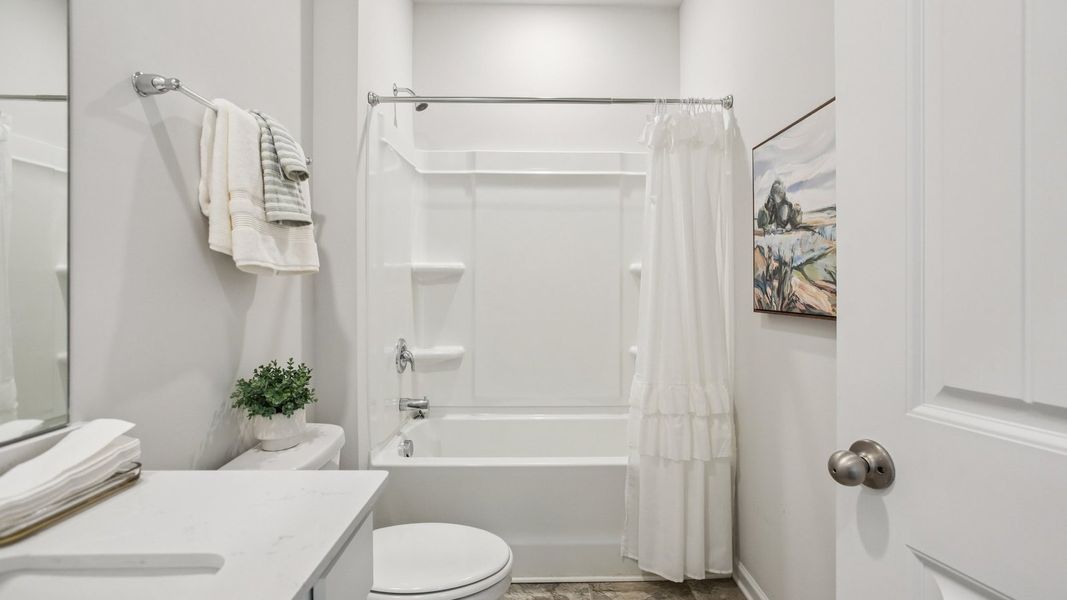 Furnished interior view inside a new home in The Parks, White House (Image 24).