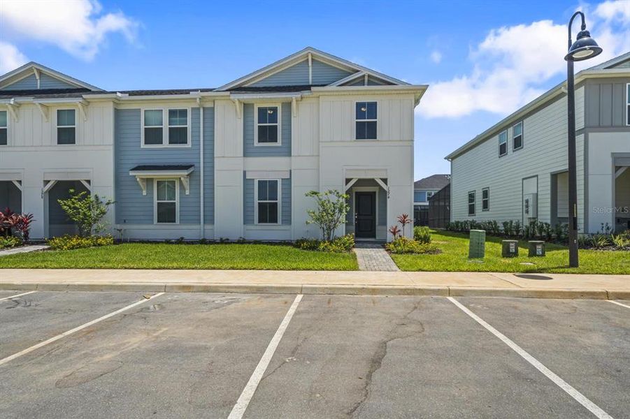 Front exterior of a new home in , Clermont, FL, highlighting curb appeal (Image 2). Front exterior of a new home in , Clermont, FL, highlighting curb appeal (Image 2).