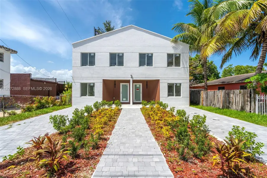 Front exterior of a new home in , Miami, FL, highlighting curb appeal (Image 1). Front exterior of a new home in , Miami, FL, highlighting curb appeal (Image 1).