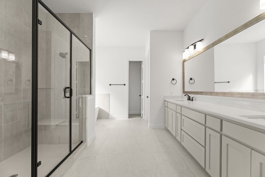 Representative furnished interior of a home built from the Hadley by Windsor Homes in Winding Creek, Rockwall (Image 13).